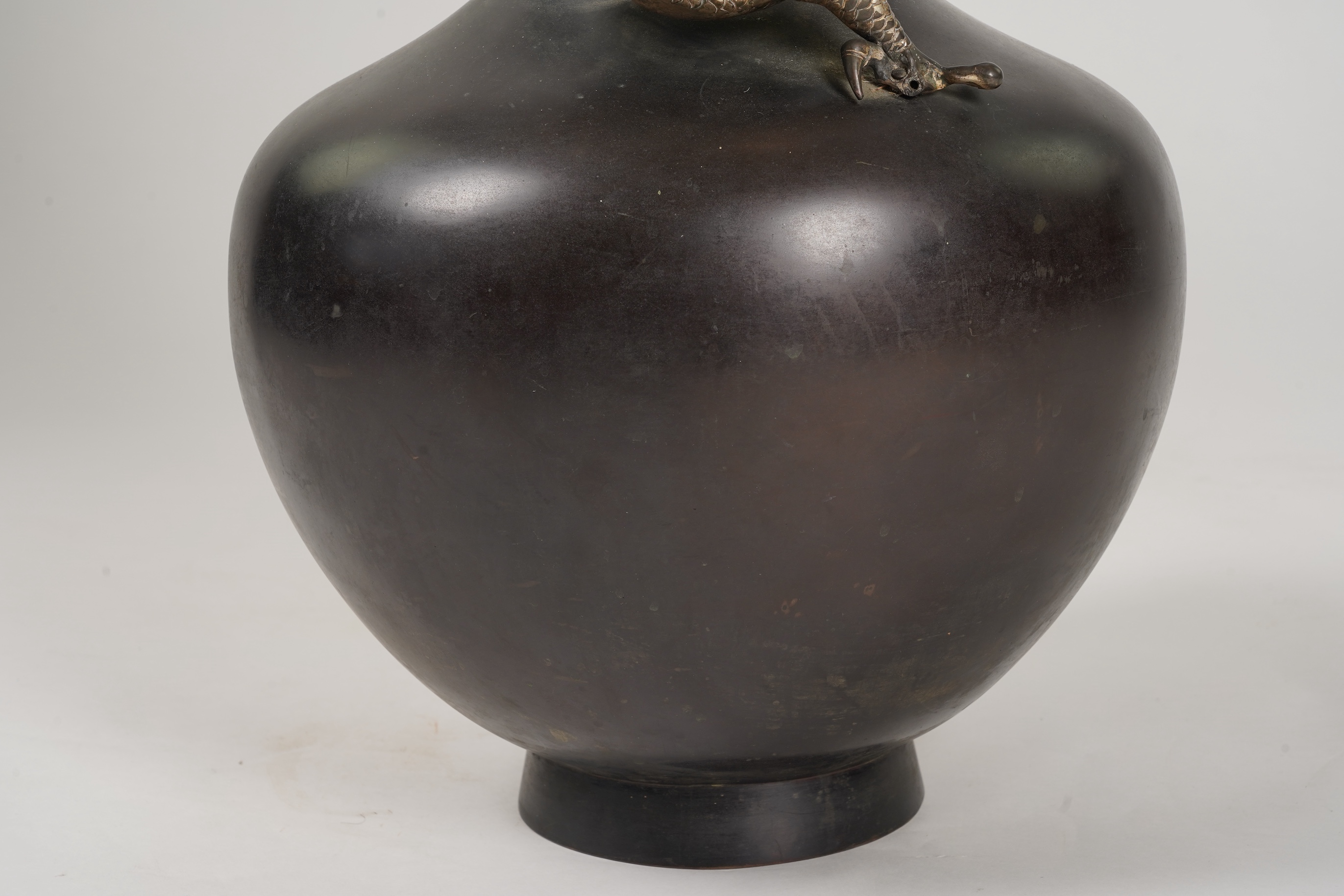 A massive Japanese bronze ‘dragon’ bottle vase, Meiji period